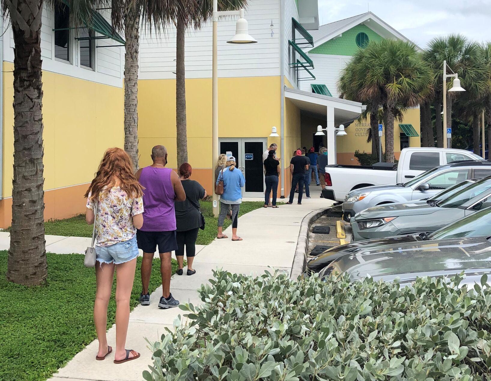 Twenty eight people were in line down the sidewalk at noon on Monday to vote at the Murray Nelson Government Center in Key Largo.